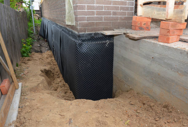Happy homeowners after waterproofing job in Mascot